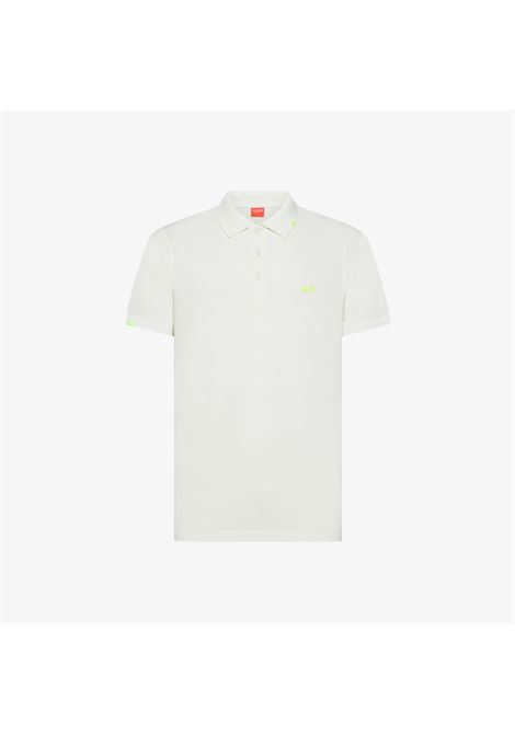 Polo con trattamento vintage in piquet di cotone bianco panna